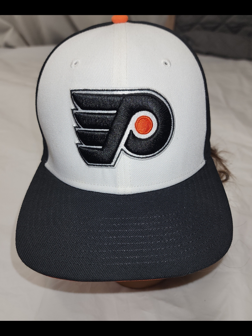Philadelphia Flyers Snapback Hat Featuring A Raised Embroidered Team Logo